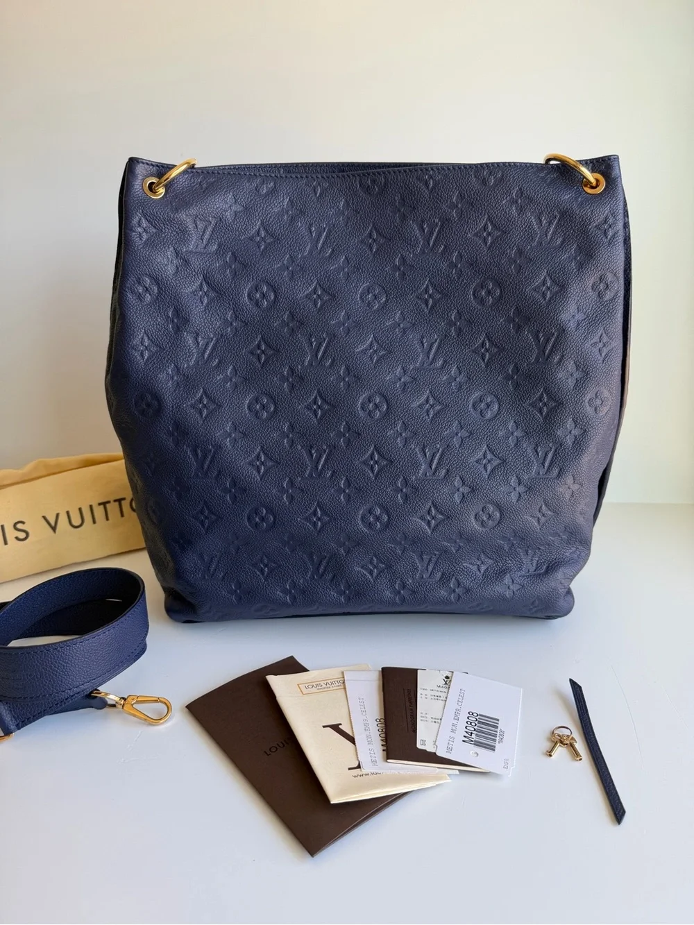 Authentic Louis Vuitton Hobo Métis Celeste Blue Empreinte Leather 2 Way Handbag